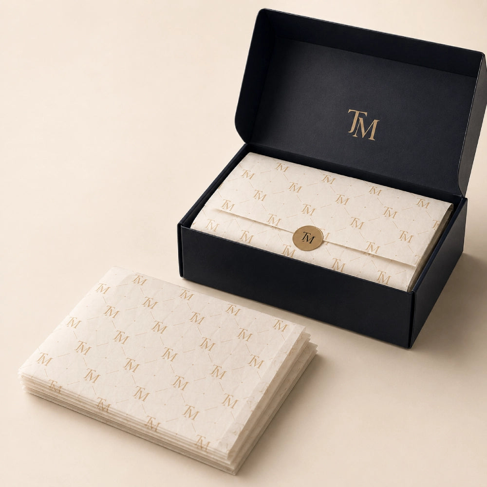 Image of Consistent custom tissue paper with repeated logo and pattern for easy business reorders